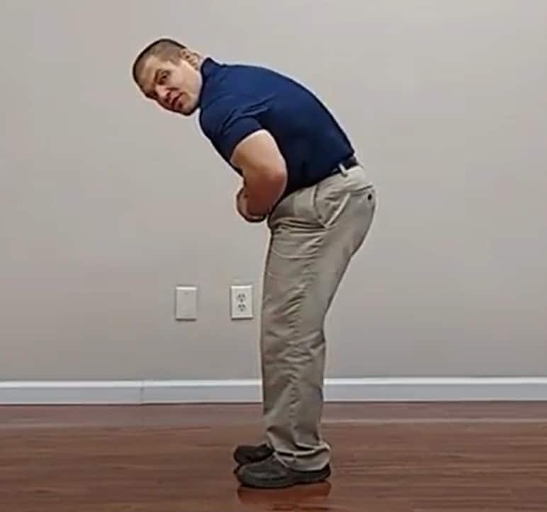 standing flexion lower back pain stretch