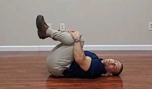 knee to chest exercise to fix spinal stenosis symptoms