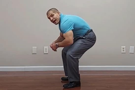 squats with a curved forward back or rounded back