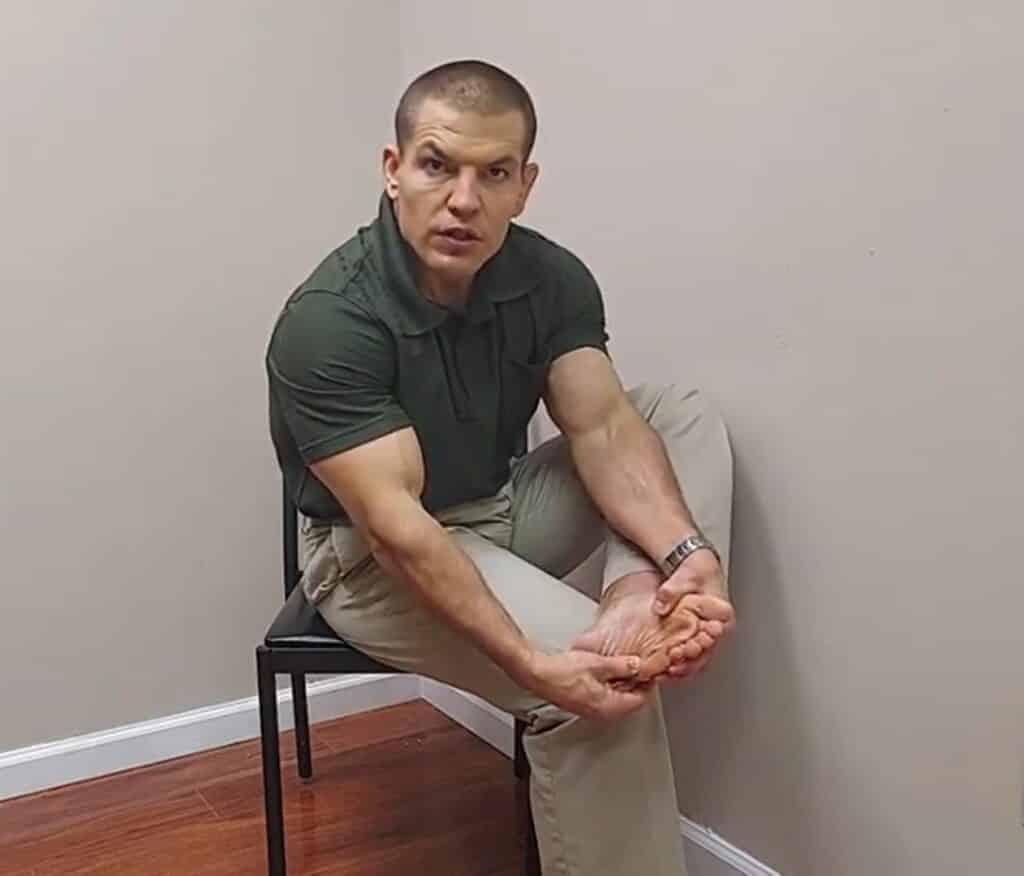 cuboid stretch for pain on outside of the foot front view