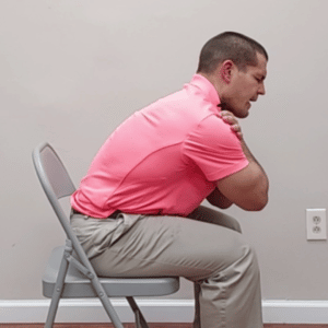 Seated thoracic extension exercise for osteoporosis