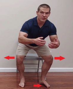 squat with arch lift and hip ER is a good glute strengthening exercise for knee pain