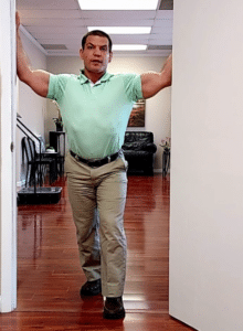 standing chest stretch in doorway
