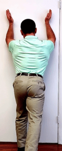 standing facing wall shoulder flexion exercise for shoulder impingement