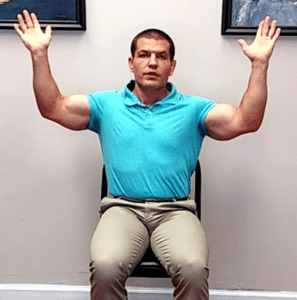 Chest stretch for numbness in little finger (seated)