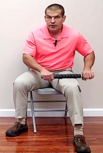 Releasing knots in quad muscles with massage stick