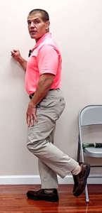 standing knee bending stretch for kneecap pain