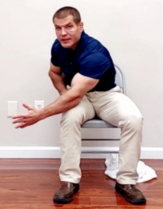 Upper back pain stretch 4 - thoracic rotation seated