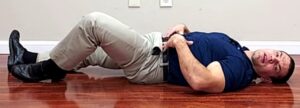 Abdominal exercise for back pain - bent knee fallout
