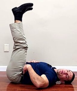 Ab exercise for back pain - double leg raises starting position