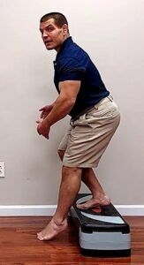 leaning forward can decrease pain under knee cap going down stairs