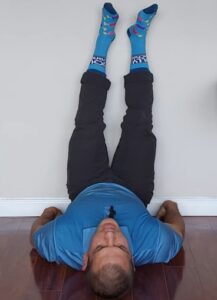 feet on wall spinal decompression technique